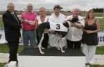 Greyhound Lenson Earl takes the plaudits with trainer Tony Collett (centre) as Tony Killingbeck (far left) presents a John Smith’s Kent Derby final qualifying trophy