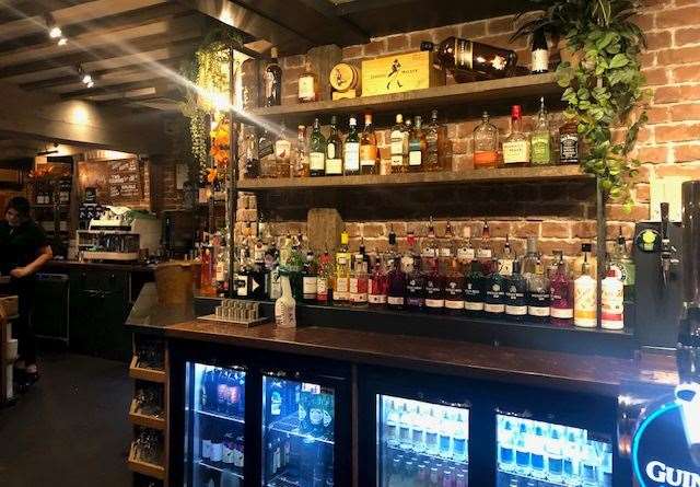 There is a large area set aside for the bar and in front of the plaster-free brickwork you'll find a wide range of different gins on offer