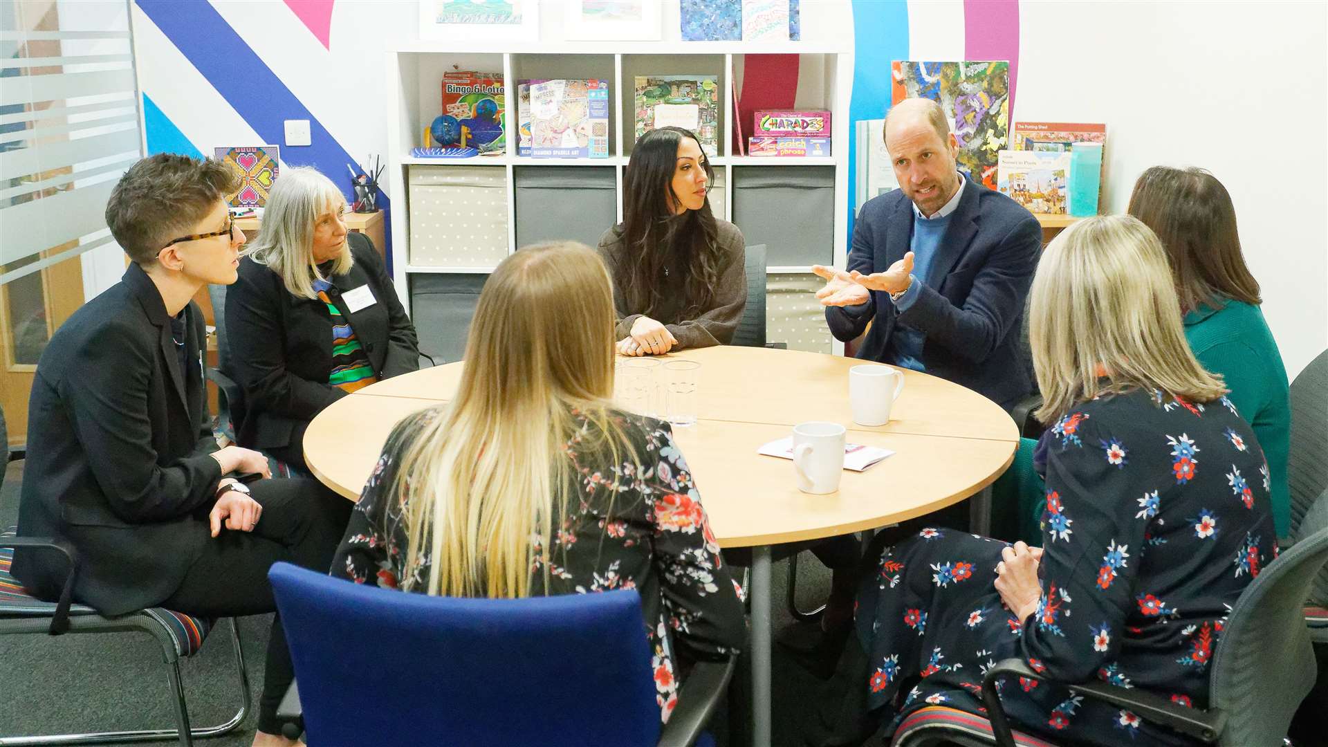 The prince speaks to a group during a visit to Homewards Newport (Dimitris Legakis/PA)