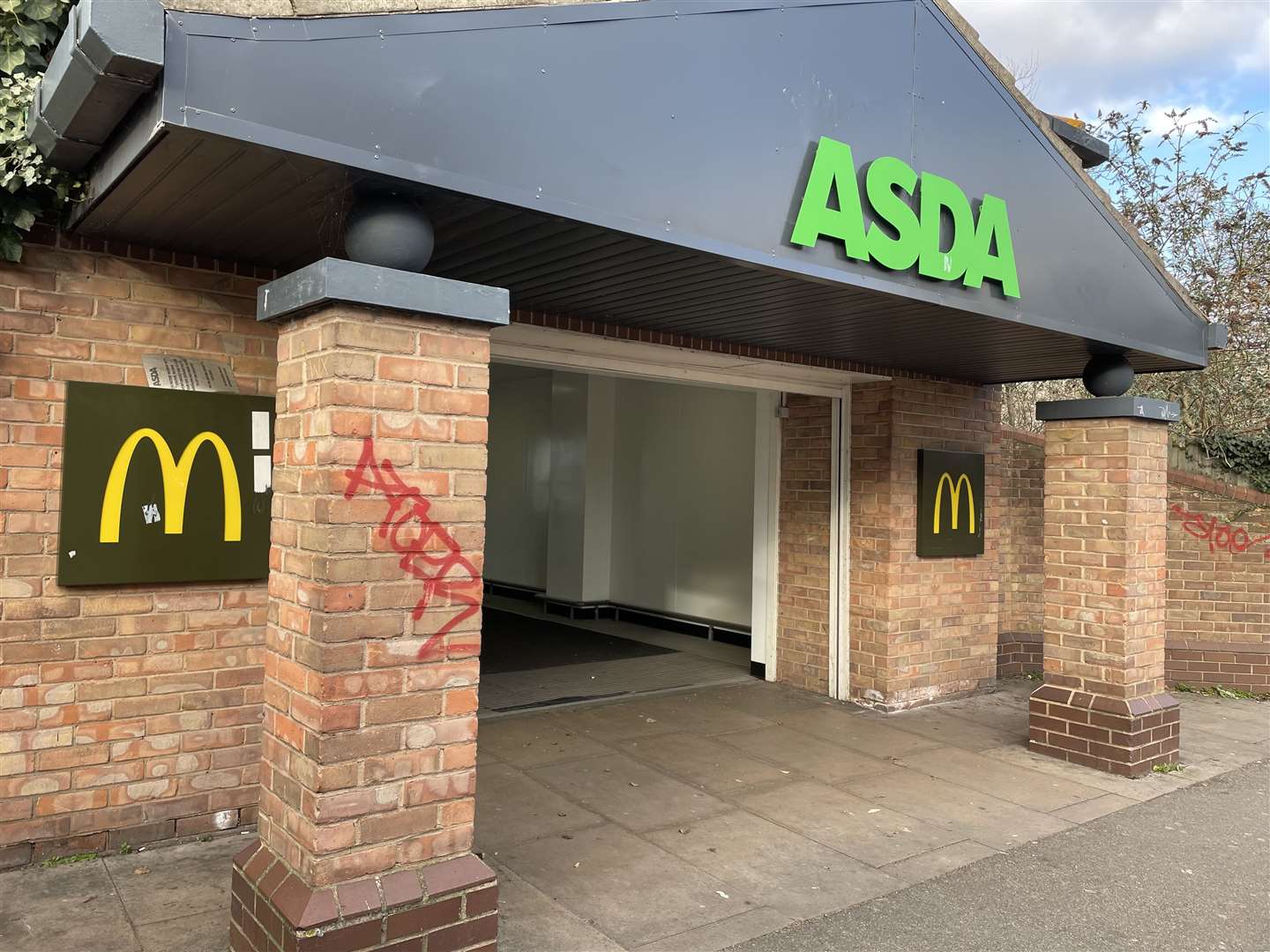 The escalator connects the store's side entrance to the Overcliffe