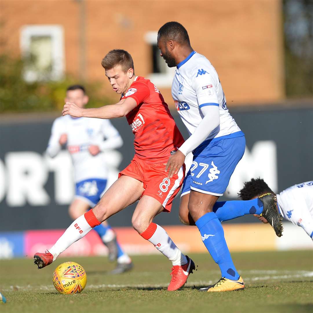 Jake Hessenthaler and Bury's Nathan Cameron contest possession Picture: Ady Kerry