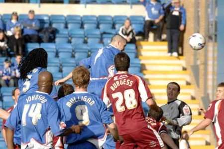 Andrew Crofts heads in Gillingham's second goal. Picture: GRANT FALVEY