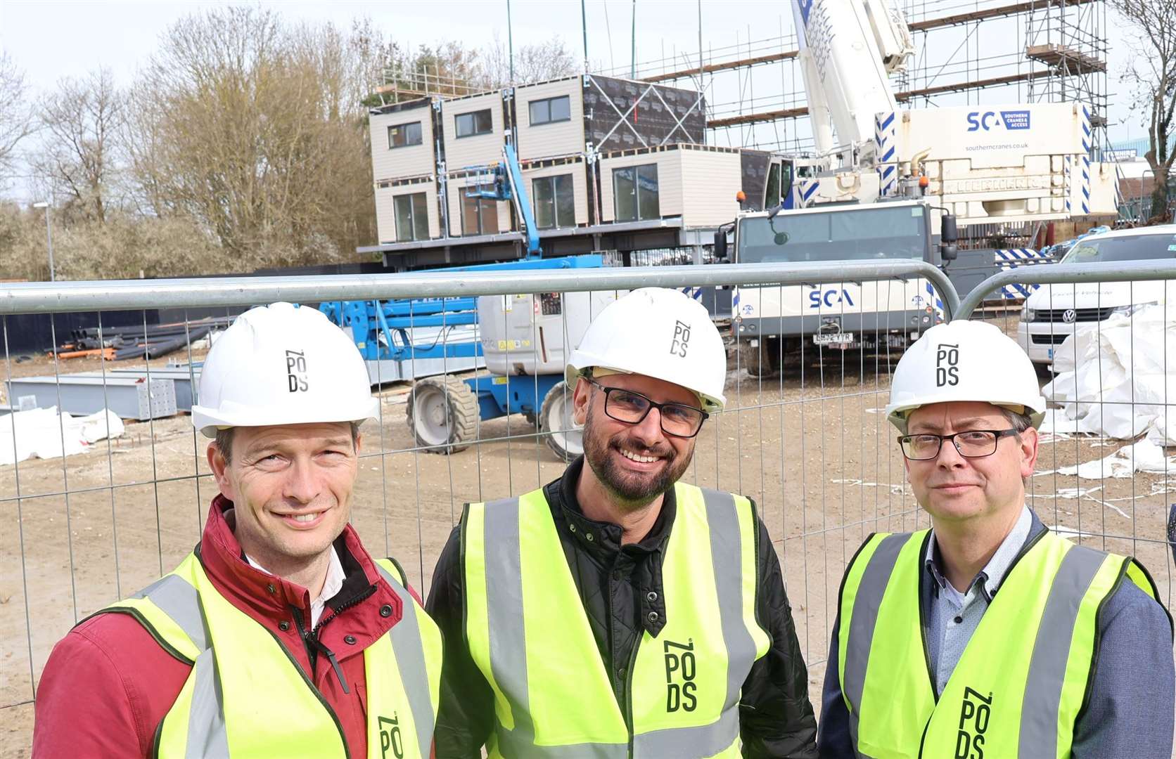 From left, Ashford Borough Council deputy chief executive Ben Lockwood, Zed Pods director Dr Rehan Khodabuccus, and Cllr Bill Barrett (Ashford Independent), cabinet member for housing and homelessness. Picture: Ashford Borough Council