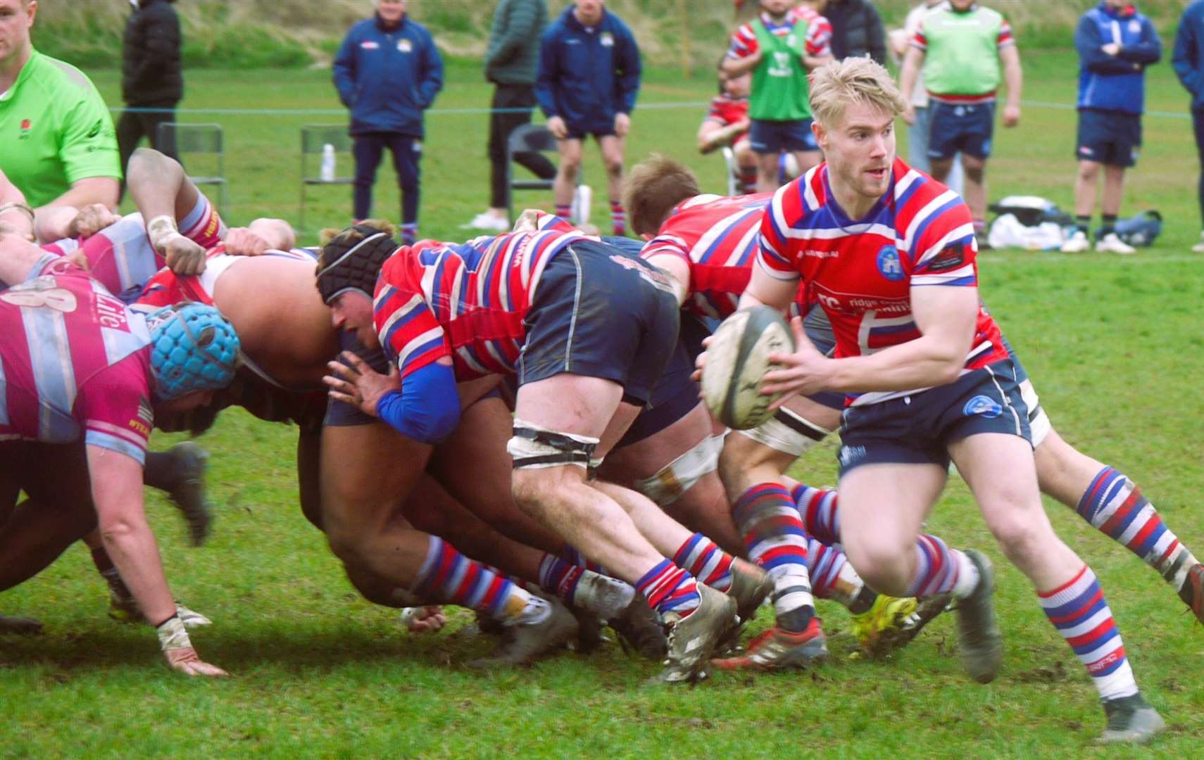 Tom Kendrick in attack mode for Tonbridge Juddians at Wimbledon. Picture: Adam Hookway