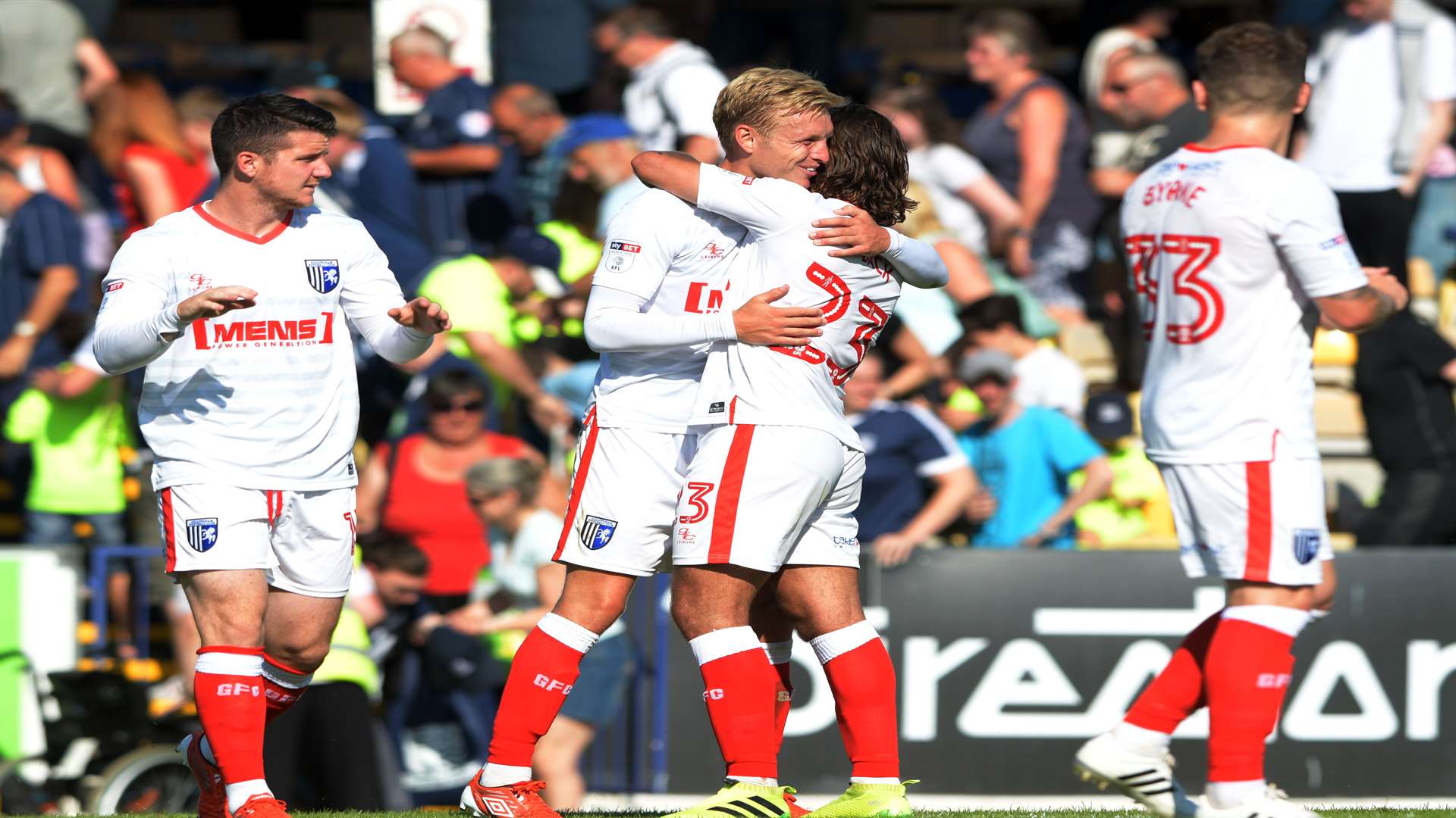 Gillingham players celebrate their win at the final whistle Picture: Barry Goodwin