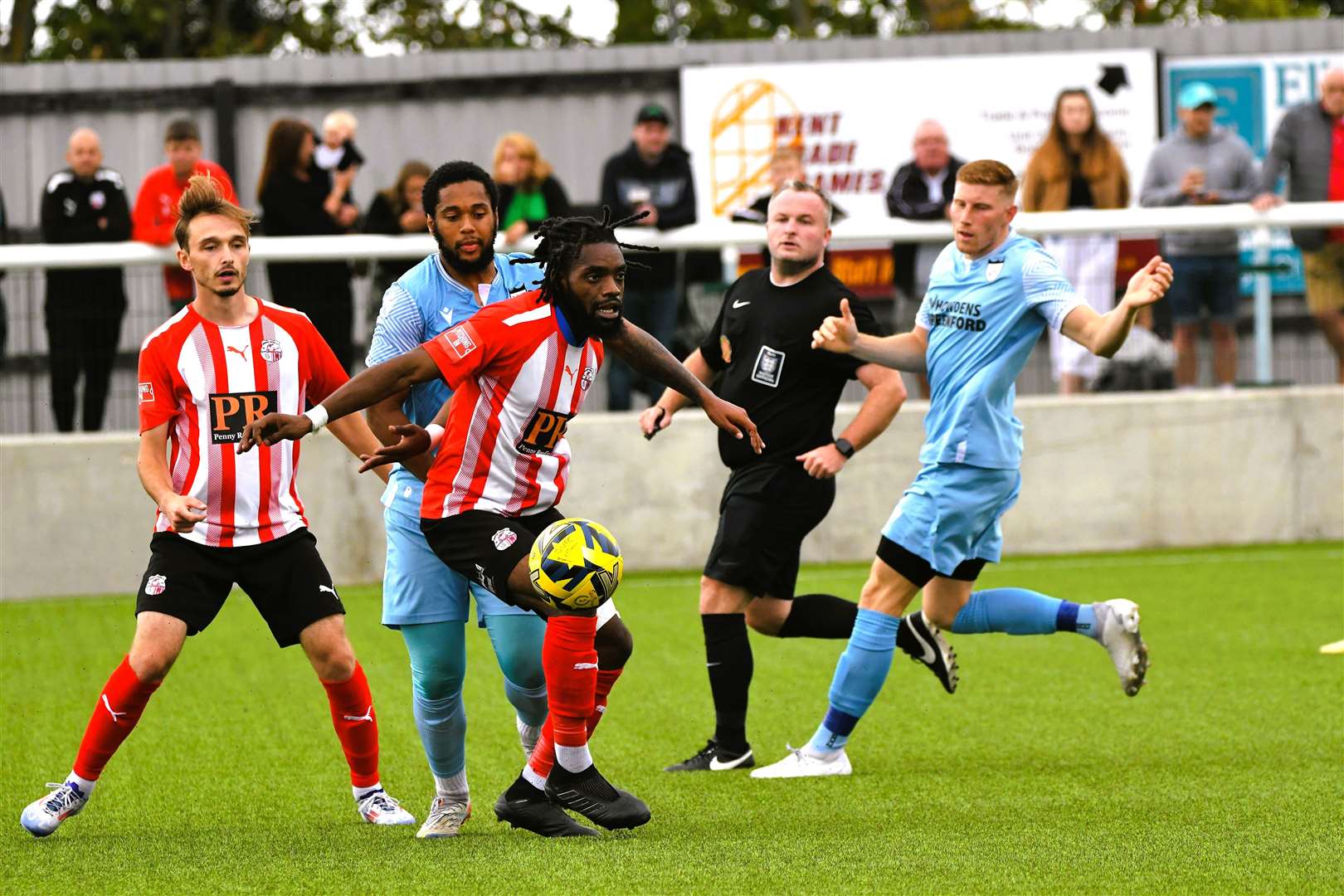 Sheppey (red) are closed down by Hanwell Town on Saturday Picture: Marc Richards