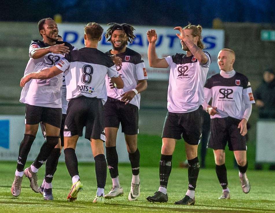 Faversham celebrate Clark Woodcock's goal during their 2-2 draw at Ashford on New Year's Day. Picture: Ian Scammell