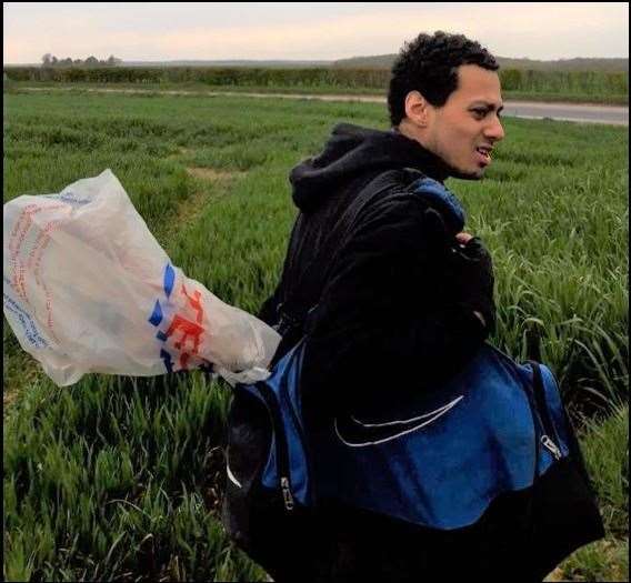 The photo taken by Gavin Tucker the day after Julia's murder shows Wheeler in countryside between Aylesham and Snowdown, carrying what is alleged to be the weapon. Picture: Kent Police