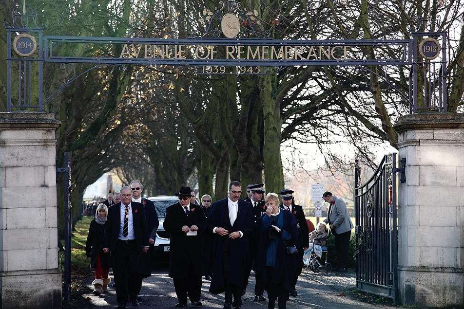 The metal railing arch as it was during a Remembrance Day march