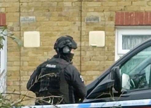 Armed police in Colonels Lane, Boughton-under-Blean, where William Cosier’s Mercedes was discovered the day after the stabbing