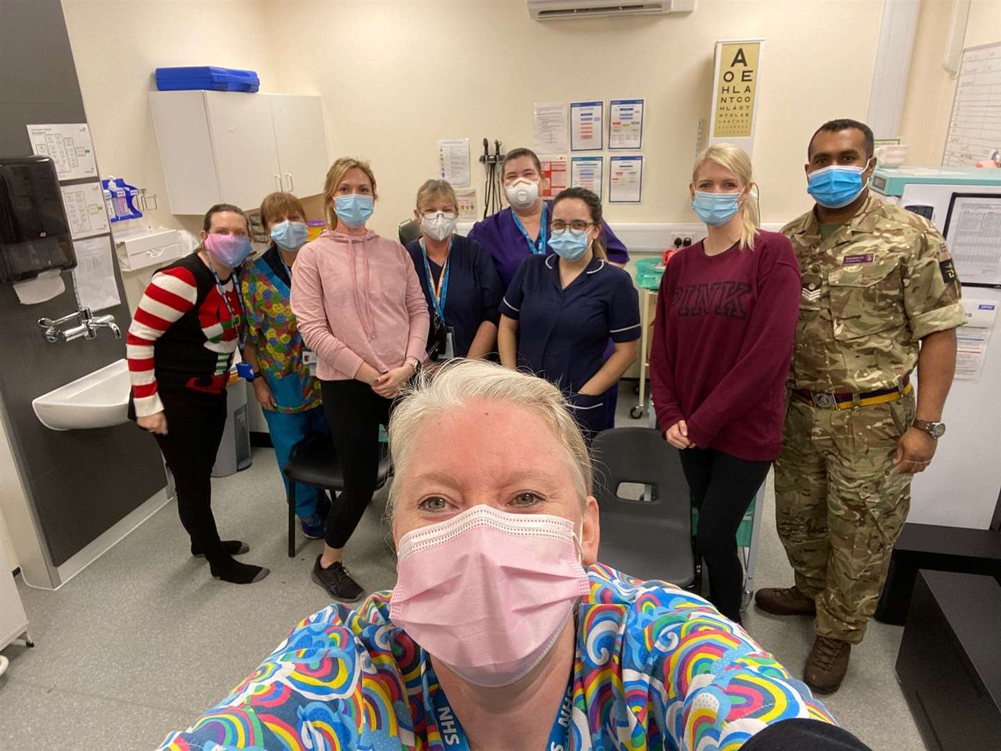 Back row, from left: Emily Hall, project support officer with the Covid Vaccination Programme (CCG); Teresa Watson, pharmacy technician with the Medicines Optimisation Team (CCG); Victoria Houston, registered physiotherapist (MOD); Carol Mayger and Katie Sheehan, pharmacy technicians with the Medicines Optimisation Team (CCG); Bethan Fox, registered nurse (MOD); Jade Brooks-Smith, registered physiotherapist (MOD); and SSgt Emosi Naivalu Jnr, an Army medic/practice manager (MOD). Front: Sandra Humphrey, pharmacy technician with the Medicines Optimisation Team (CCG)