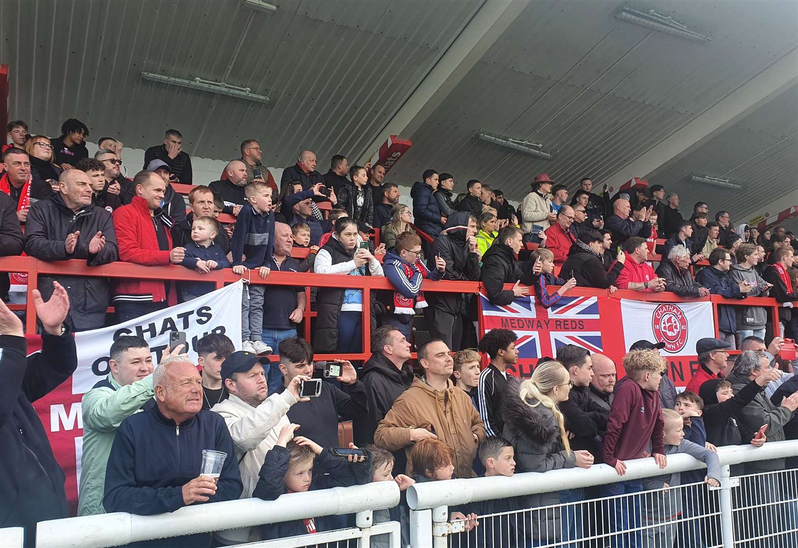 Chatham supporters stay behind to watch the celebrations in their numbers