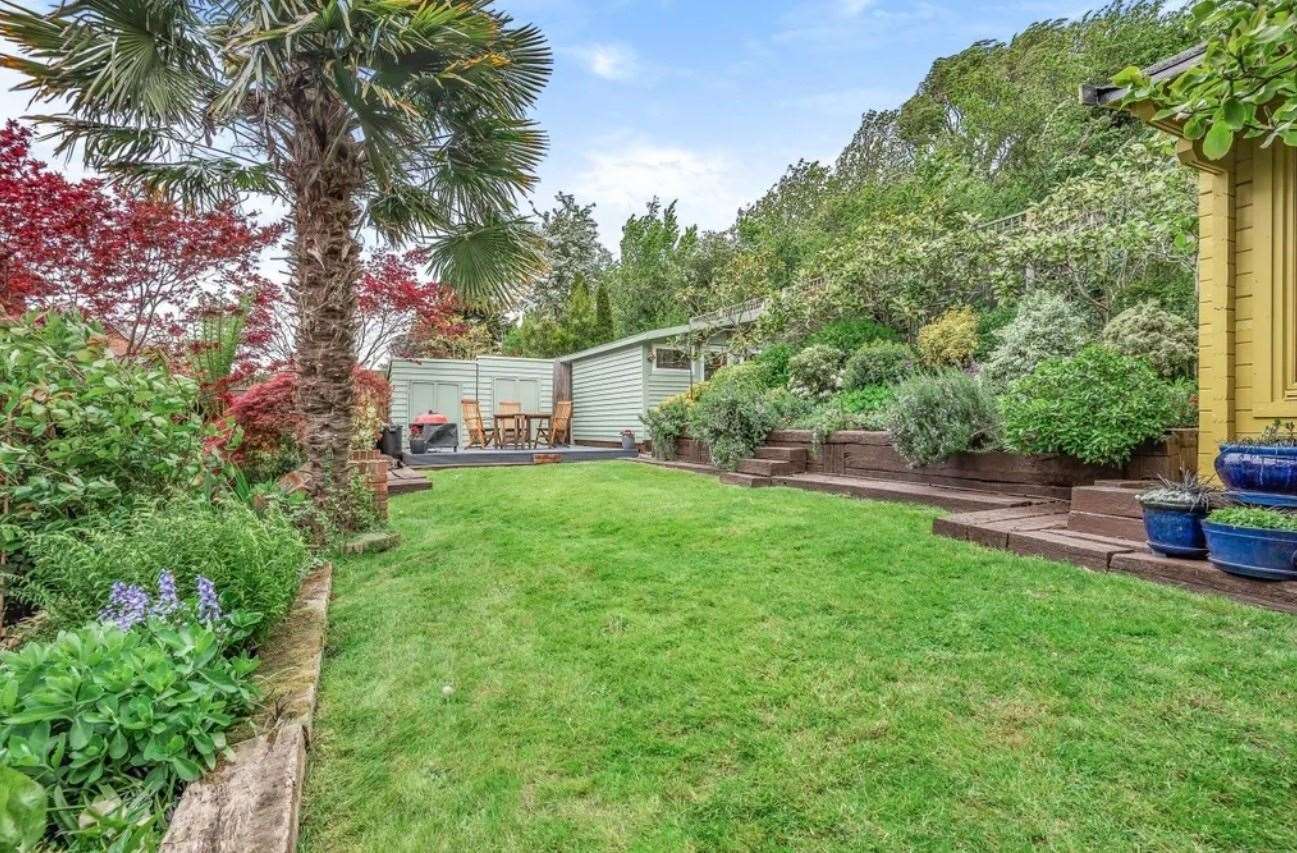 The 'beautifully landscaped' rear garden. Picture: Zoopla / Fine & Country