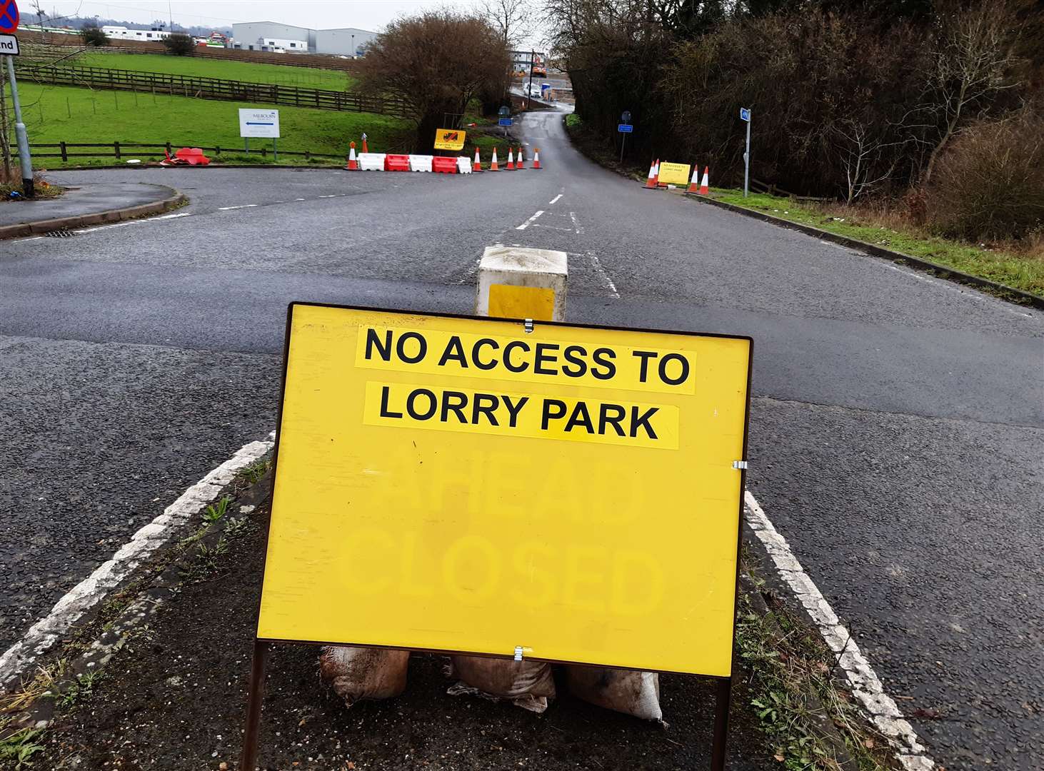 Signs in Church Road, Sevington, were put up before the lorry park opened