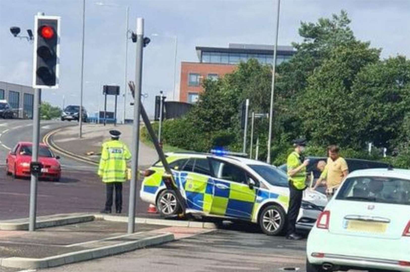 The damaged police car at the junction of Beaver Road and Victoria Road in Ashford. Picture: Faye Ward