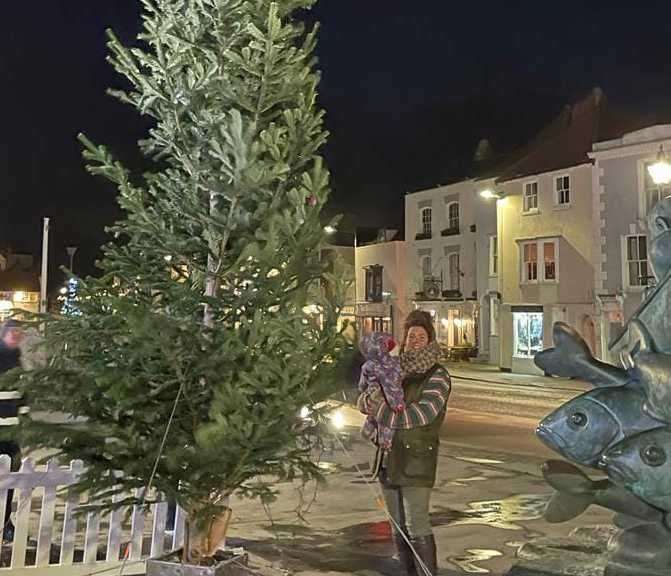 Sarah Doyle from Archers Low Garden Centre and Nursery next to the new tree. Picture: Archers Low Garden Centre and Nursery