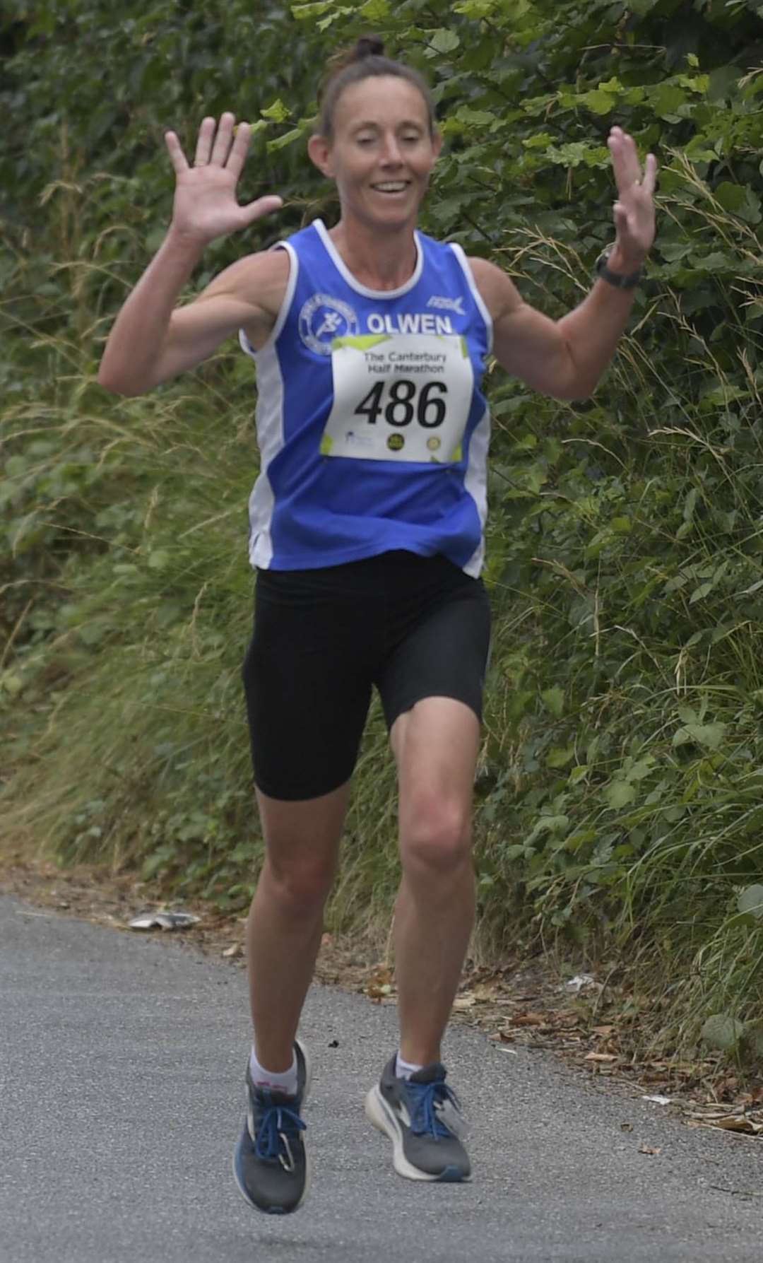 Olwen Cockell raises a smile as she pounds the course. Picture: Barry Goodwin