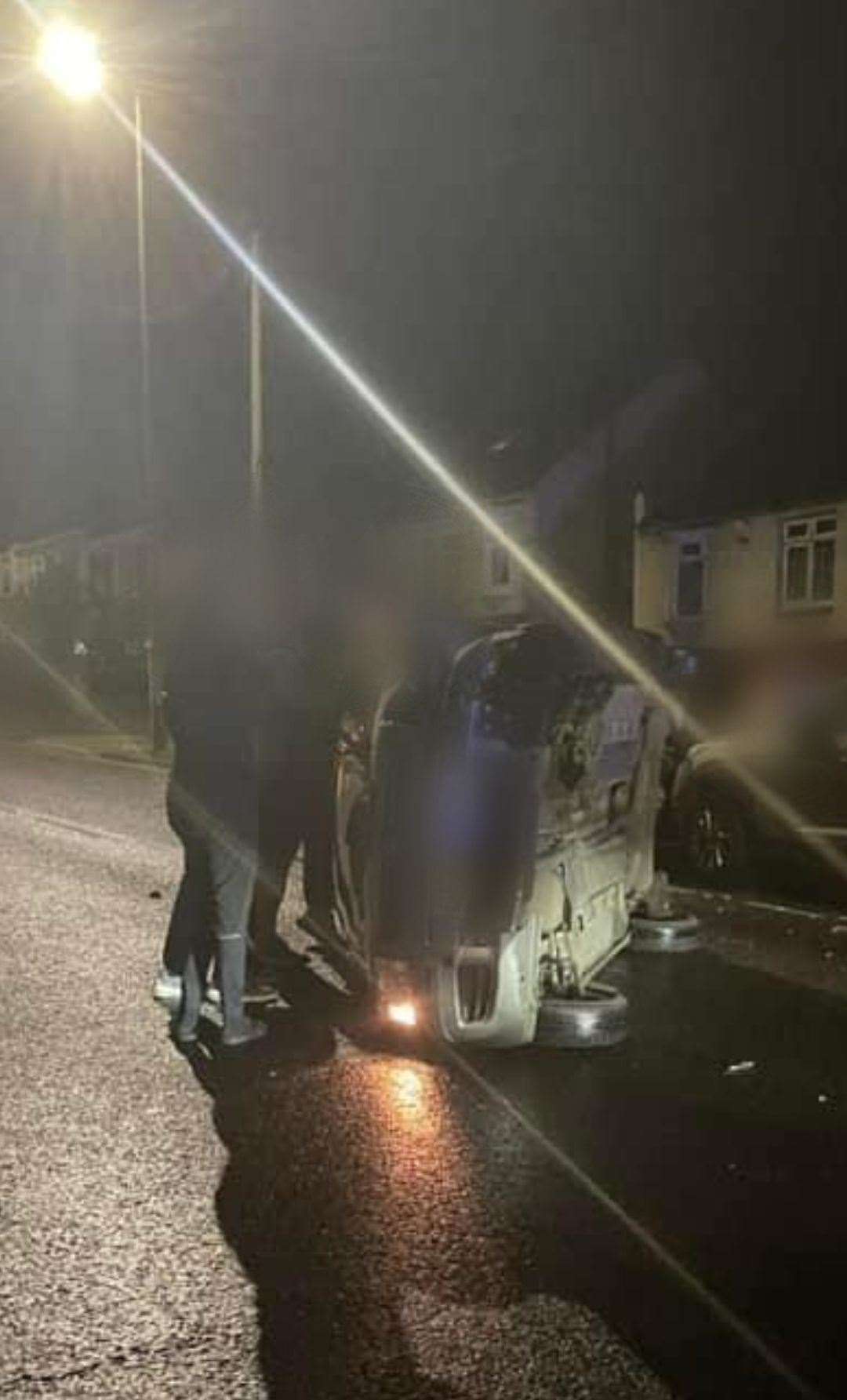 The flipped vehicle on Maidstone Road, Chatham