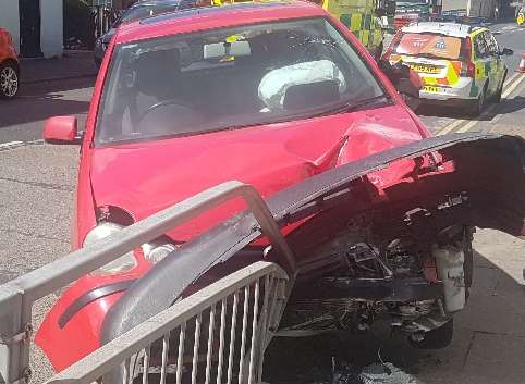 The car hit crash barriers outside the Borno pharmacy