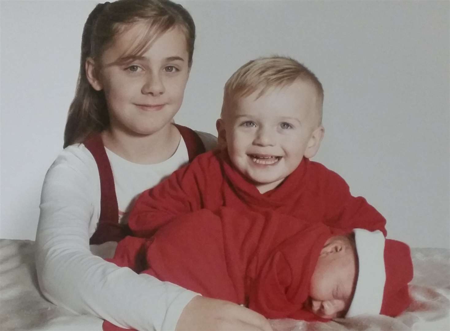 Ralphylee with his half-sister Ruby, nine, and half-brother Harvey, two