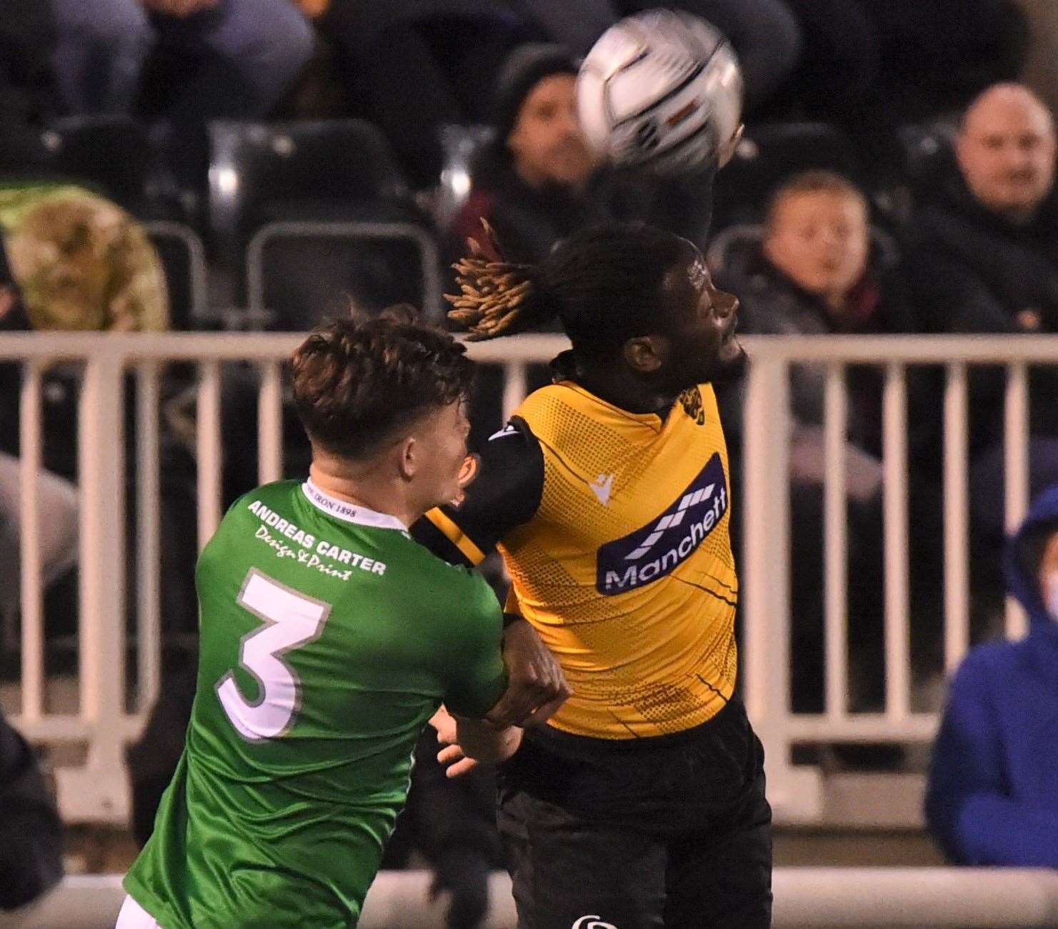 Maidstone United substitute Christie Pattisson wins a header against Braintree Picture: Steve Terrell