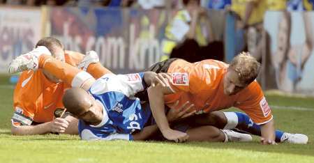 Simeon Jackson is stopped in his tracks by the Hartlepool defence