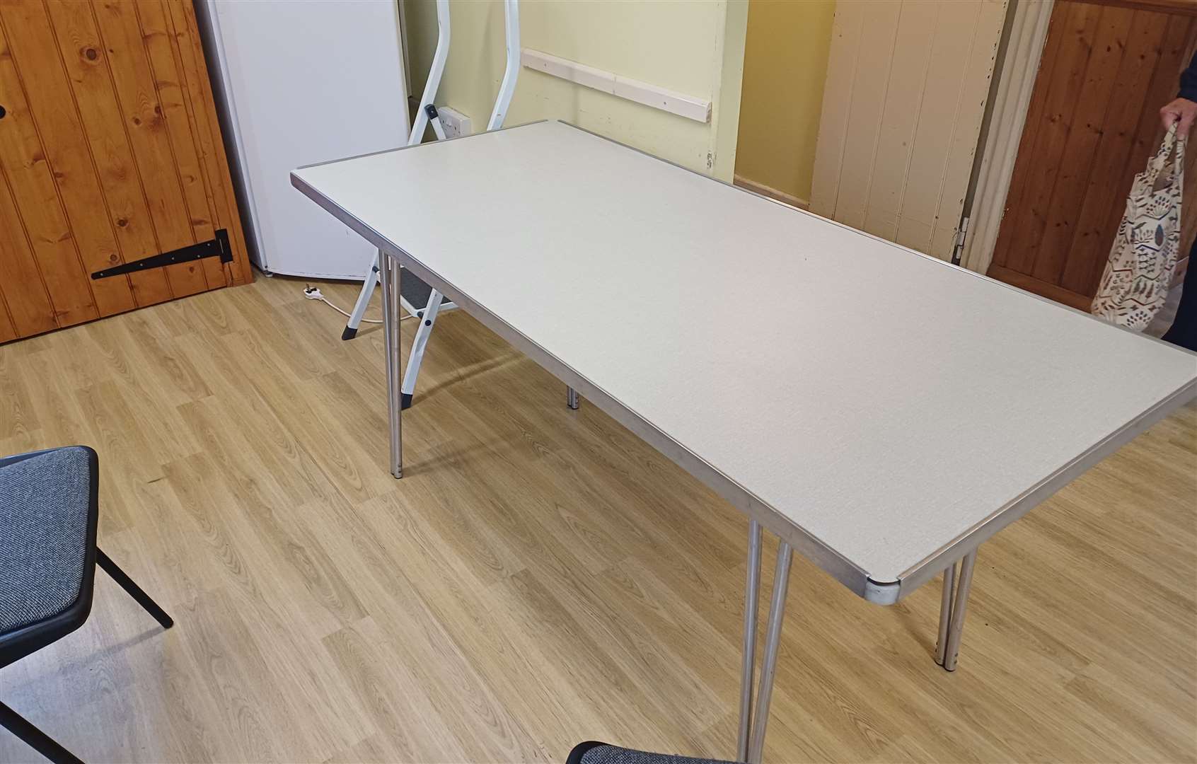 The table in the Grafty Green village hall where the satellite Post Office should have set up