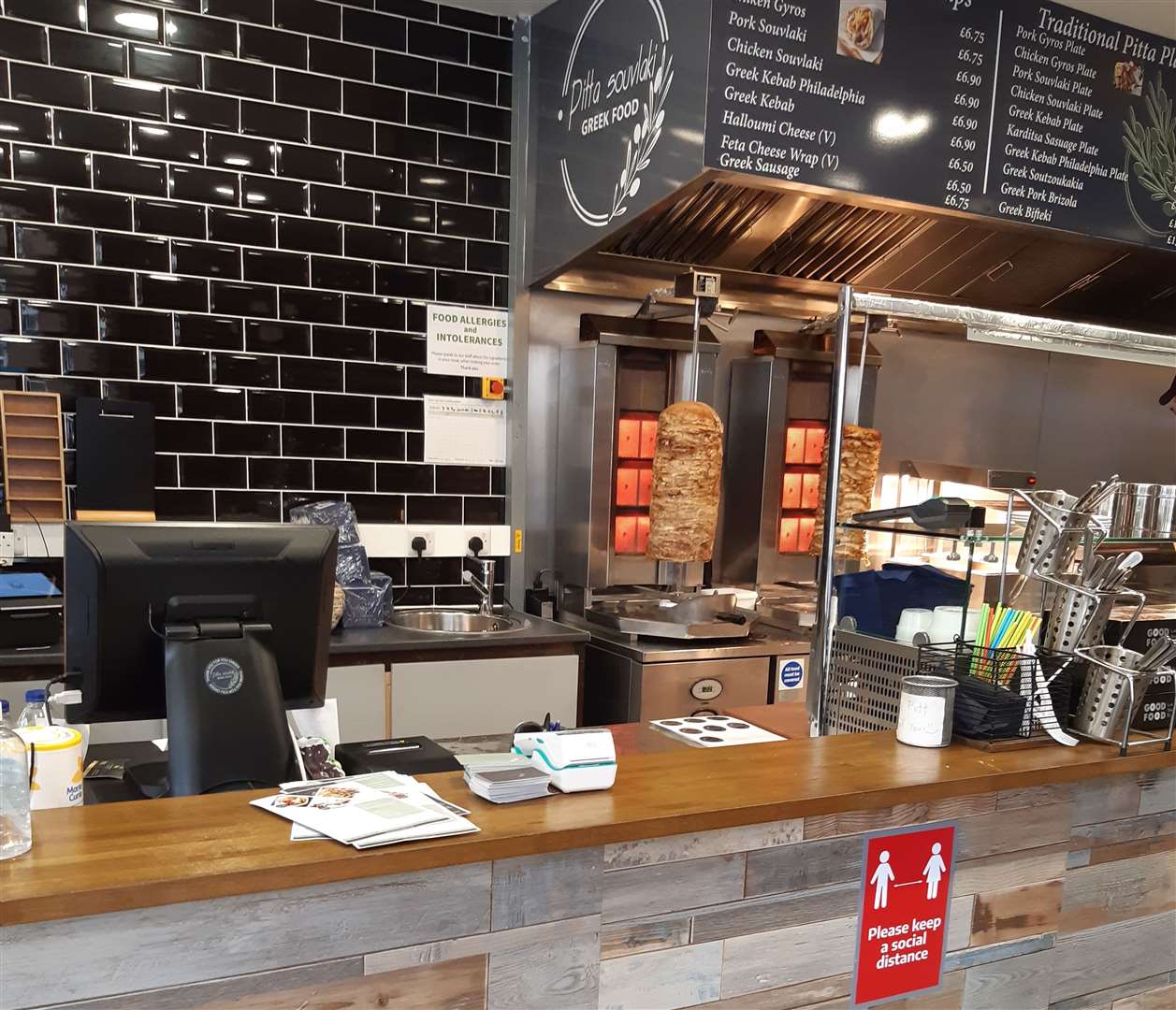 The inside waiting area of Pitta Souvlaki in Pudding Lane