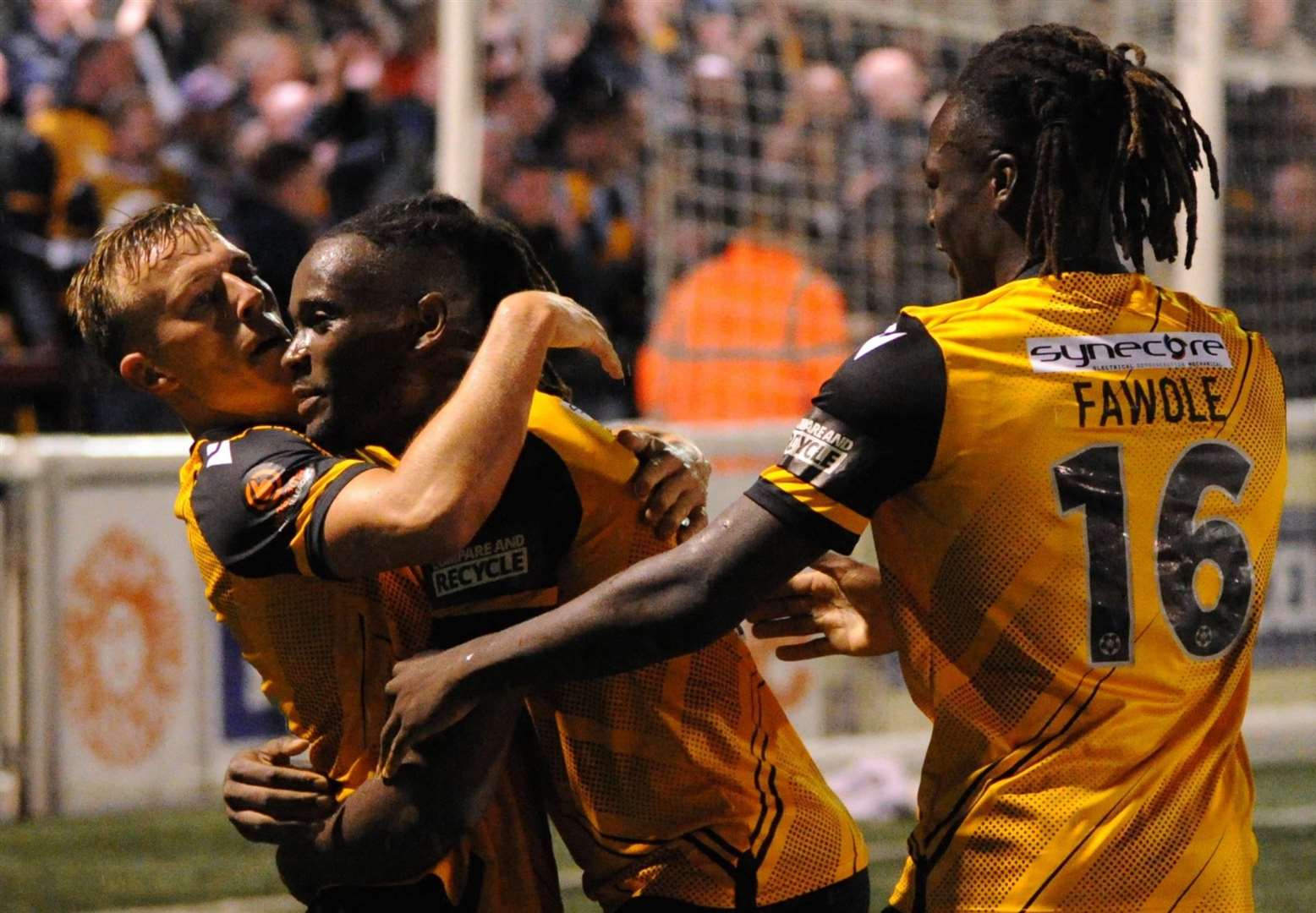 Sam Corne celebrates his goal with provider Christie Pattisson and Josh Fawole Picture: Steve Terrell