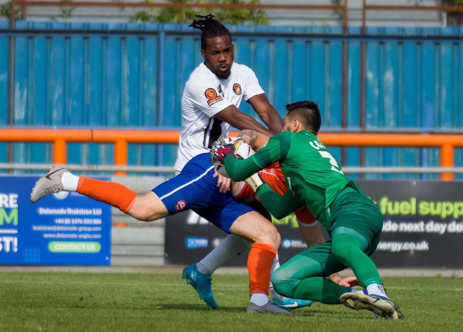 Ebbsfleet striker Dominic Poleon is thwarted by former Maidstone goalkeeper Lucas Covolan at Braintree on Monday. Picture: Ed Miller/EUFC