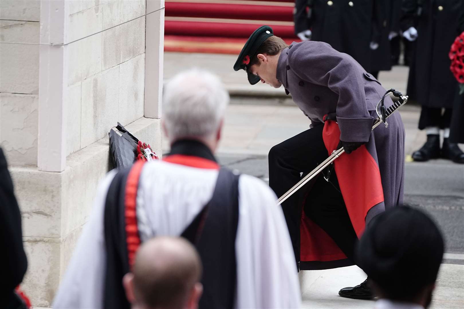 The Queen’s equerry Major Ollie Plunket lays her wreath during the Remembrance Sunday service at the Cenotaph (Aaron Chown/PA)