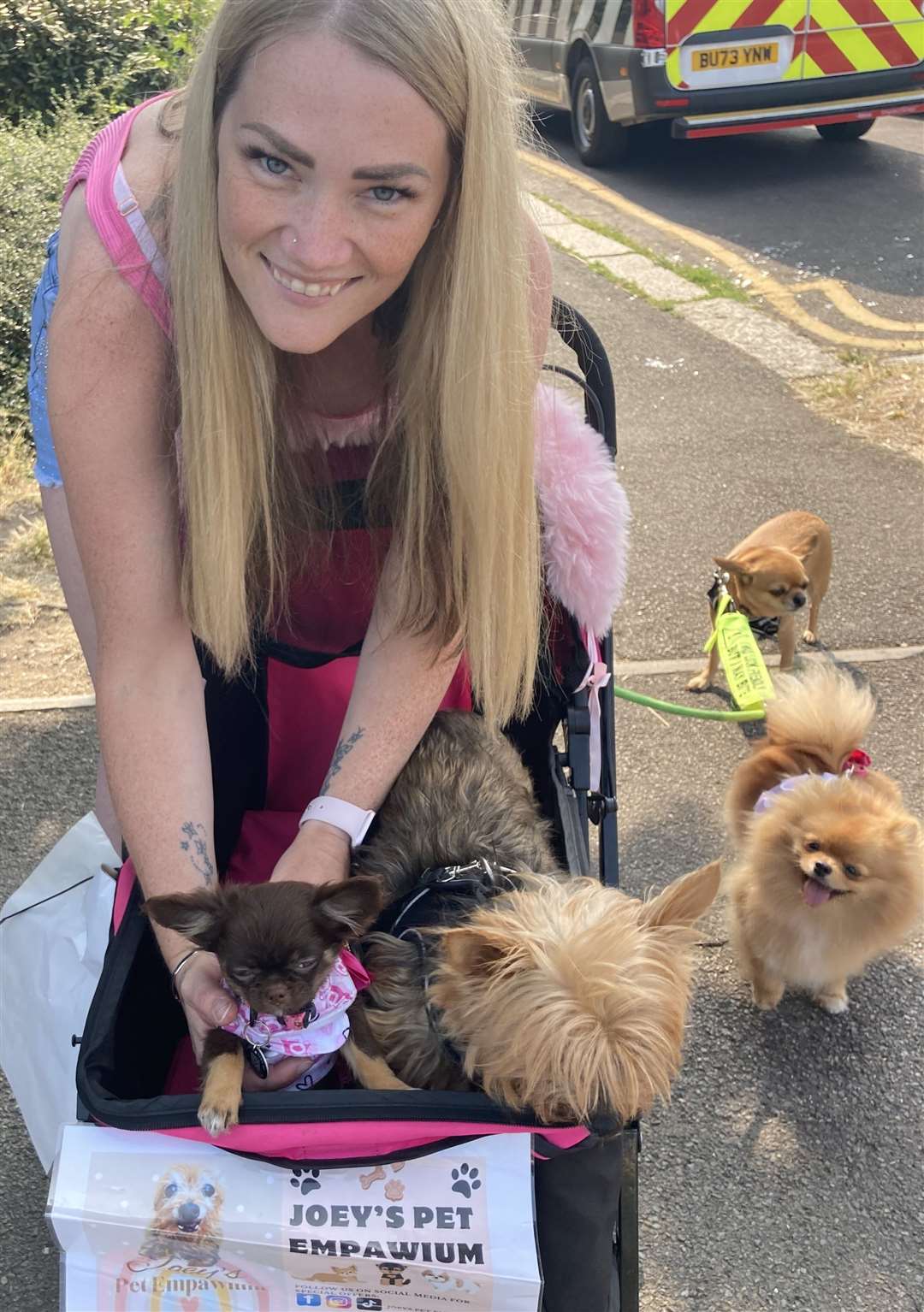 Abbie Holland of Joeys Pet Empawrium with her dogs Bruiser, Beau, Dolly and Princess. Picture: John Nurden