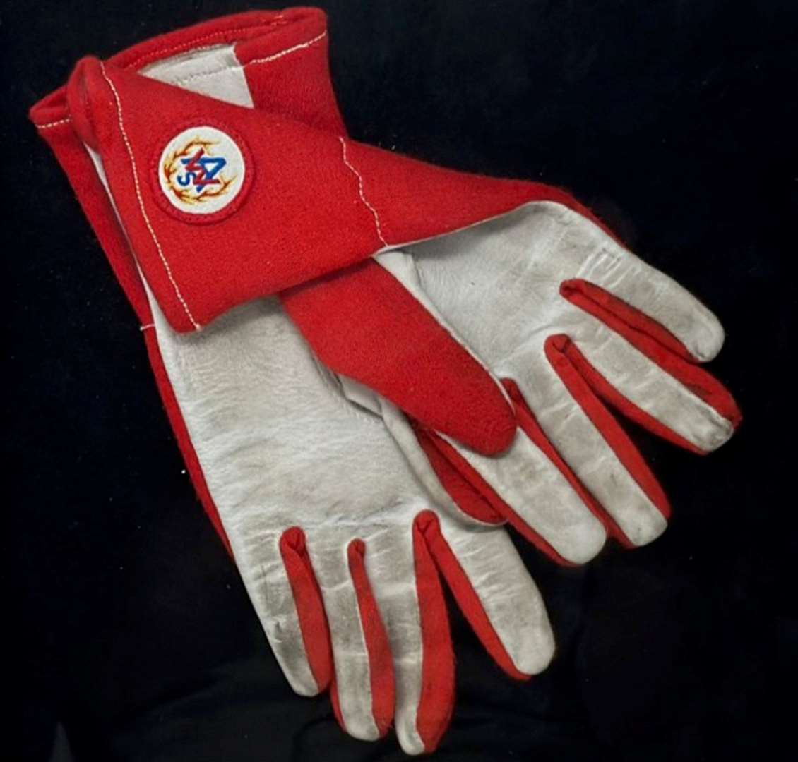 A pair of racing gloves worn by Princess Diana at Buckmore Park are up for auction. Picture: SWNS