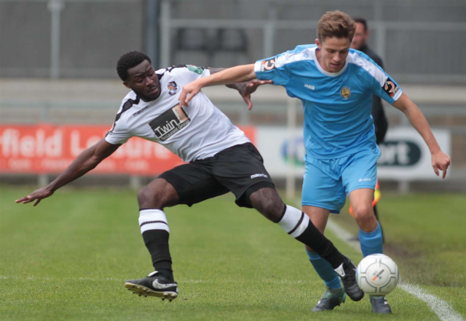 Dartford's Mark Onyemah battles with East Thurrock's Danilo Orsi-Dadomo on Monday. Picture: John Westhrop