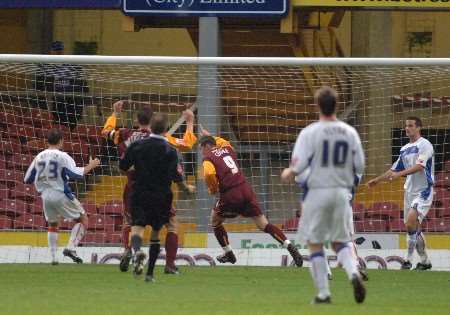 Gills defenders can only watch as Andy Cooke scores his late winner. Picture: MATTHEW READING