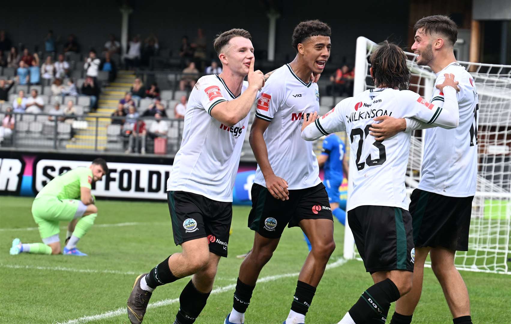 Luke Baptiste, second left, celebrates with his team-mates after making it 3-0. Picture: Barry Goodwin