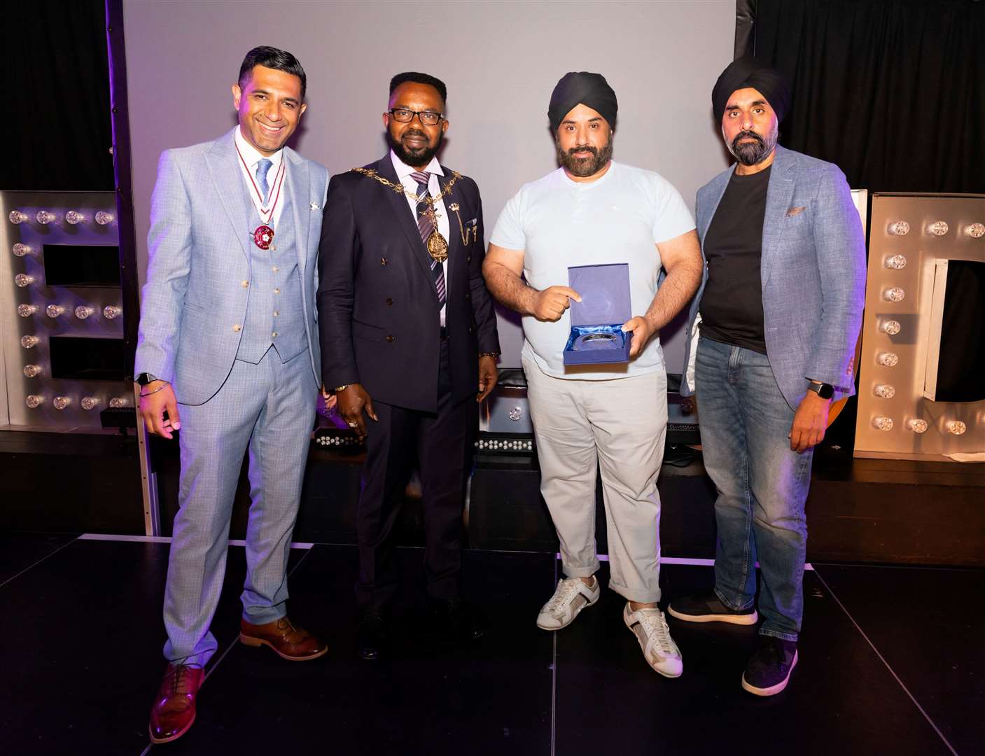 From left to right: Gurvinder Sandher, the Mayor of Gravesham, Bhavinder Singh Sandher and Indi Sal. Picture: Cohesion Plus