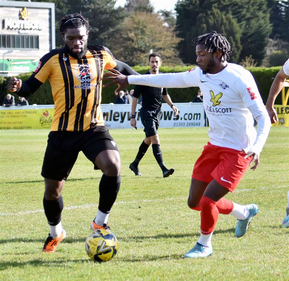 Folkestone forward David Smith stands his ground against Lewes. Picture: Randolph File