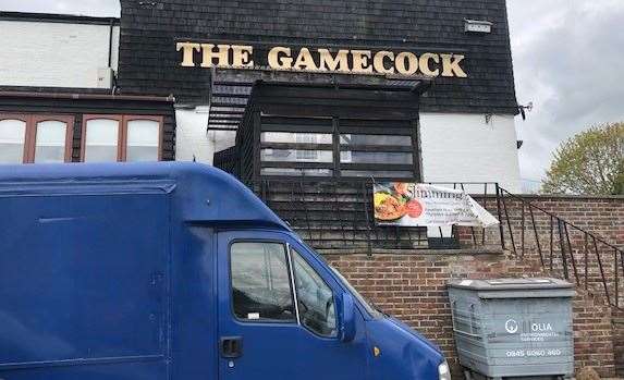 This is the side of the pub, viewed from the car park, with the smoking shack in a central position