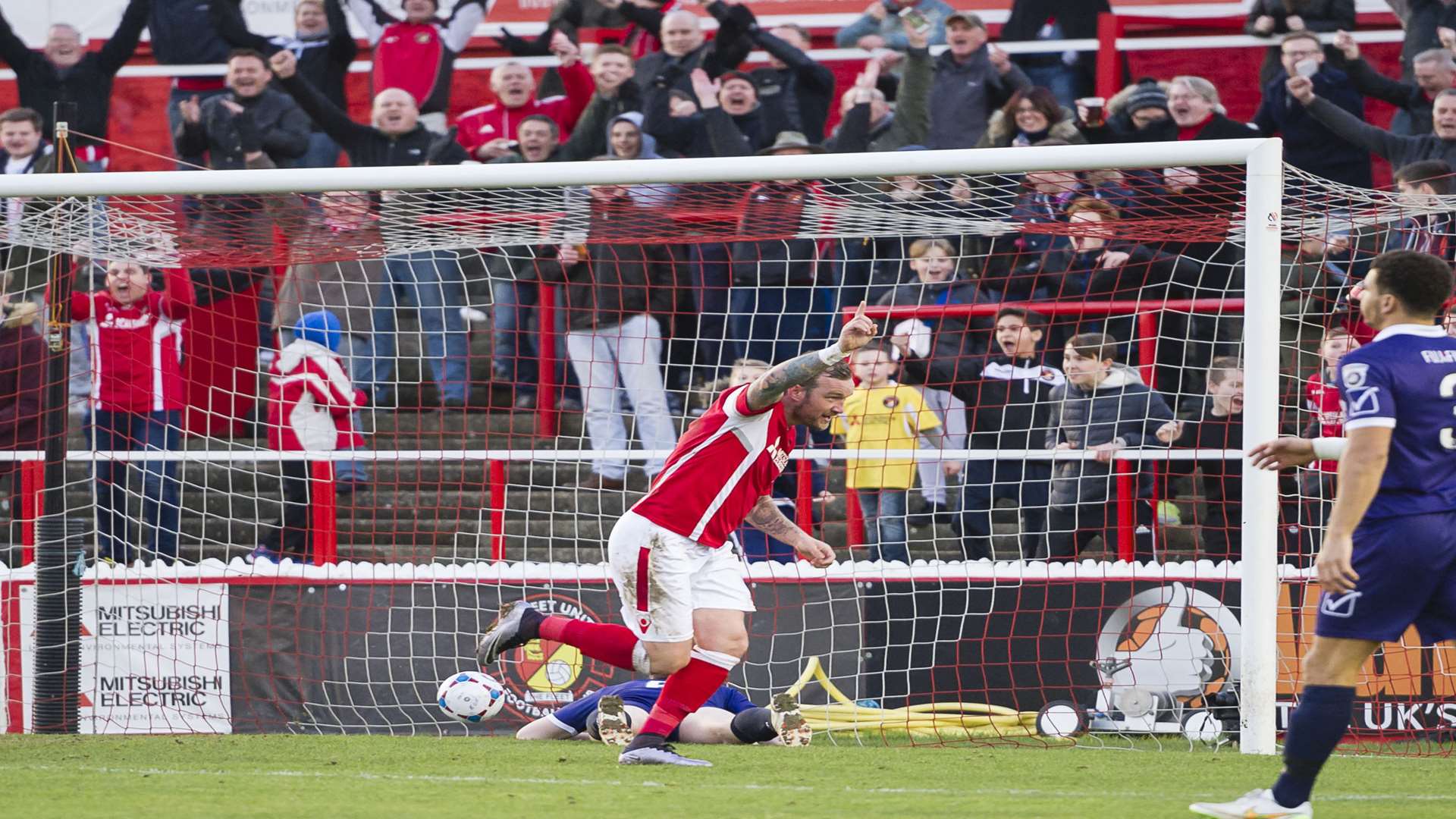 Danny Kedwell wheels away after levelling the scores early in the second half Picture: Andy Payton