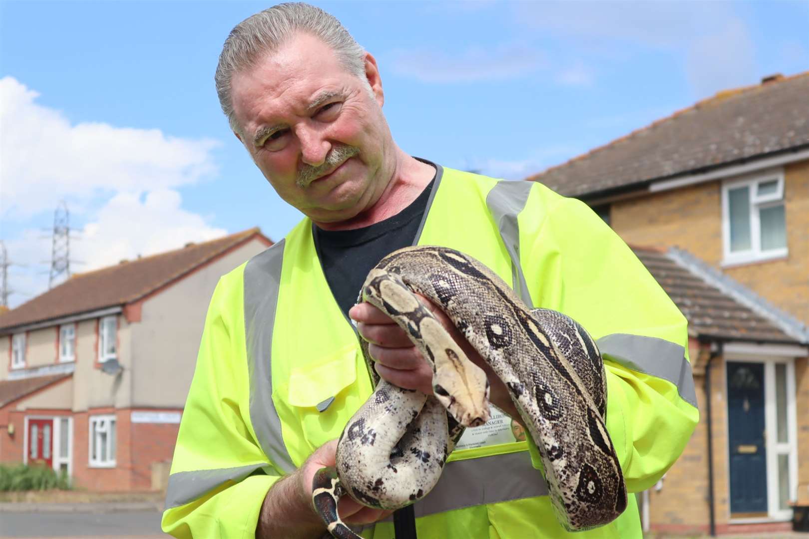 Ray Allibone of Swampy's Wildlife Rescue in Sheerness with a boa constrictor