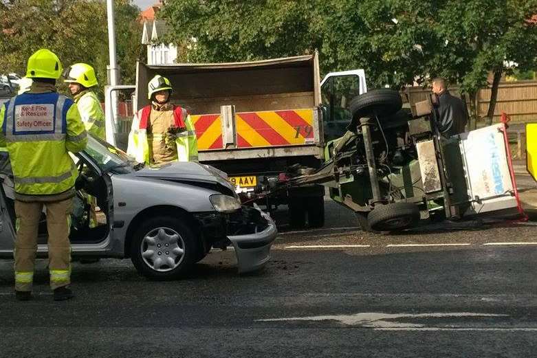 The silver Peugeot has hit a log cutter