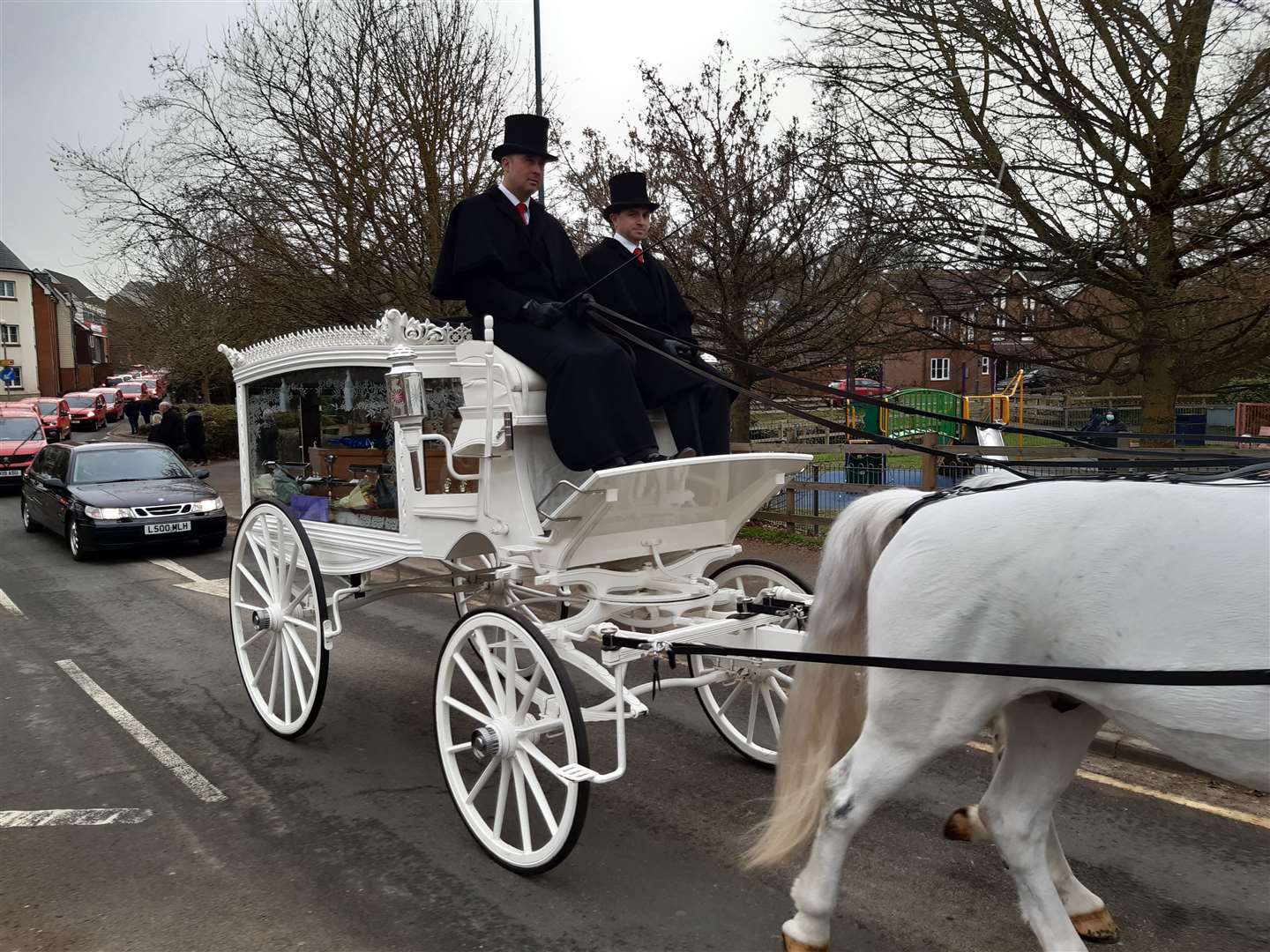 A horse-drawn carriage took Mr Dunmill on a final trip of his postal rounds