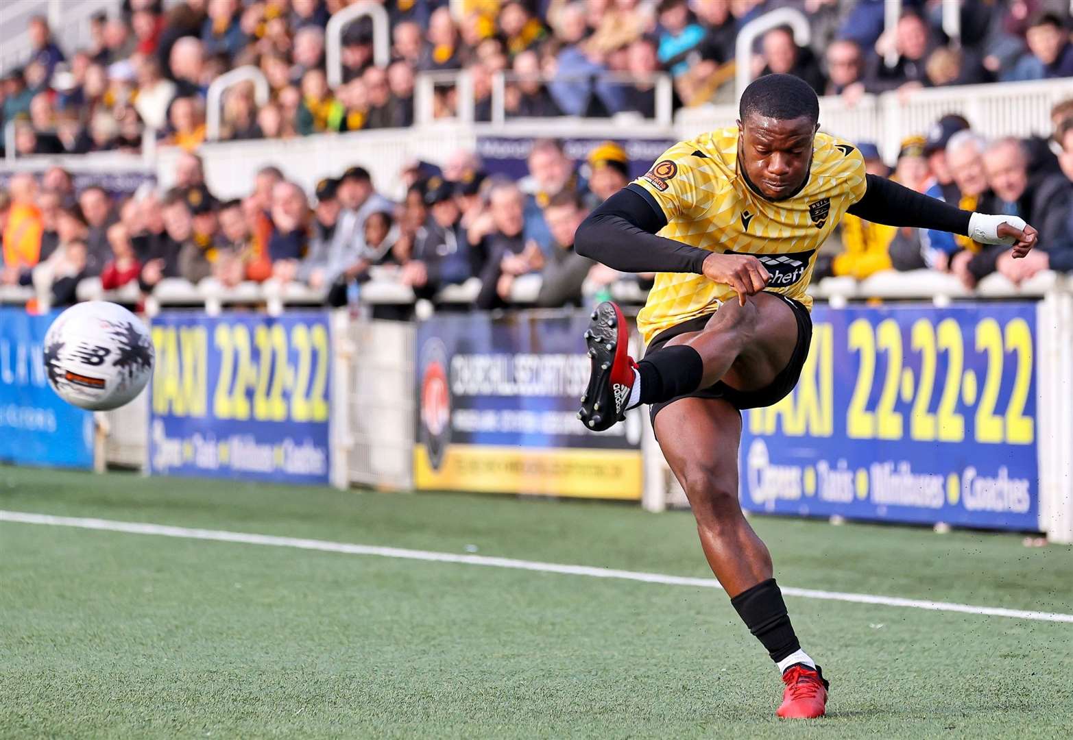 Chi Ezennolim plays in a cross from the left as Maidstone look for a way back. Picture: Helen Cooper