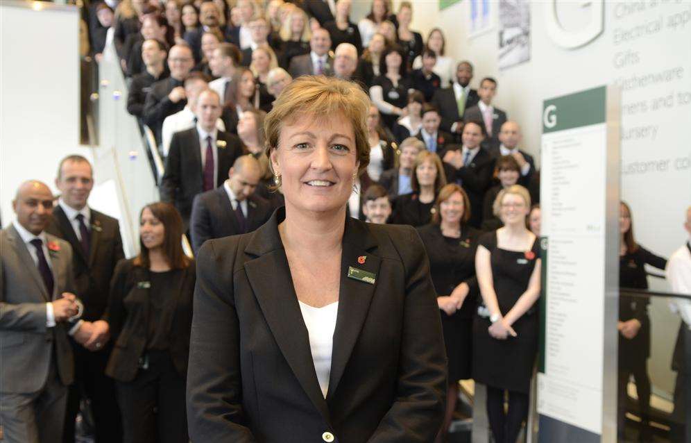 Store manager Glynis Guning-Stevenson and staff get ready for the first customers