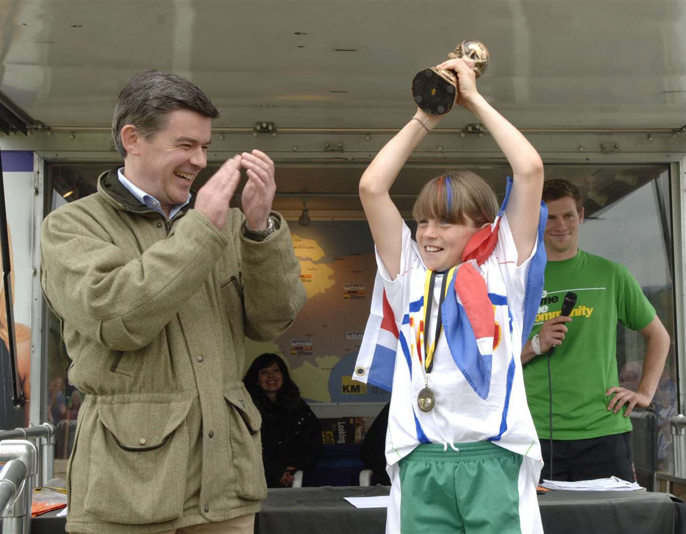 Alessia Russo, aged 11, lifts the cup for East Farleigh Primary after winning the KM Mini World Cup of 2011, pictured with the then MP Hugh Robertson