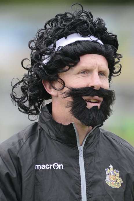 Maidstone assistant manager Steve Ward, dressed as Brighton FA Cup hero Steve Foster last season, has left the club Picture: Martin Apps