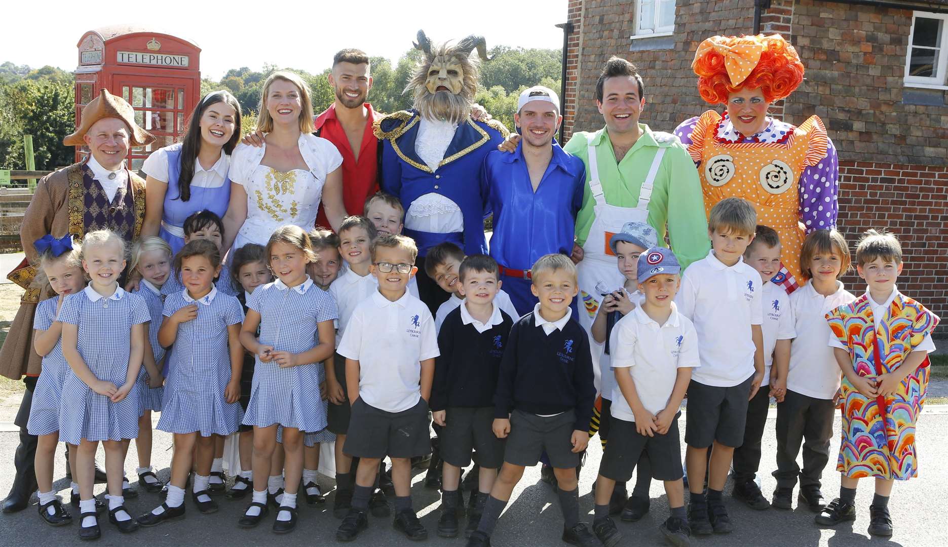 The cast of Beauty and the Beast with children from Valley Invicta Primary School at Leybourne Chase Picture: Andy Jones