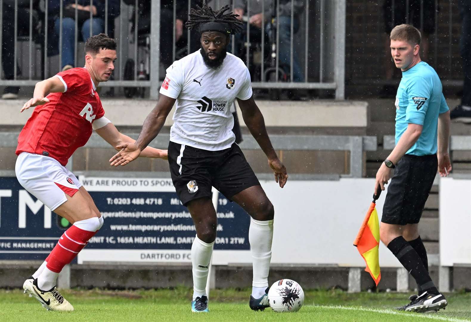 Dartford’s Duane Ofori-Acheampong holds off Lloyd Jones of Charlton. Picture: Keith Gillard