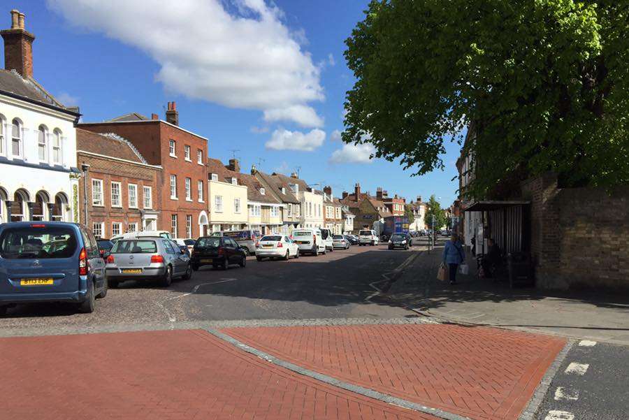 The lorry, which has been stuck for two hours, has caused gridlock in the town centre.